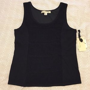 Black sleeveless top (can be casual or dressy)